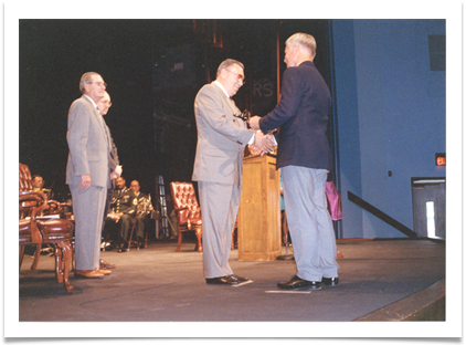 Ed is presented with the OMA Hall of Fame Saber, 1994